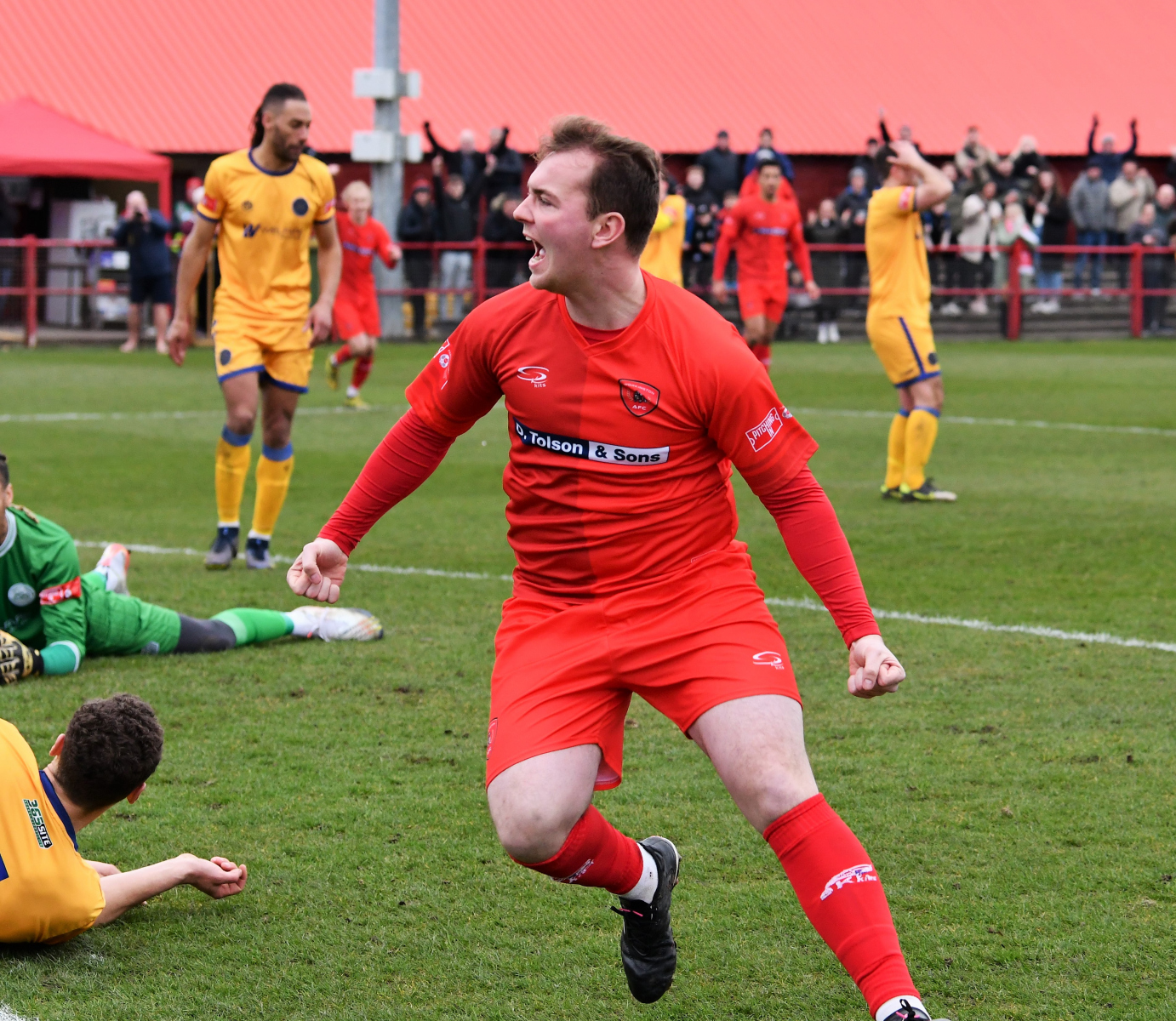 Lewis-Reilly-celebrates-his-opening-goal-for-the-Reds-Ben-Challis